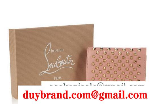 可愛いピンク色の christian louboutin クリスチャンルブタンのレデイース用のミニ財布